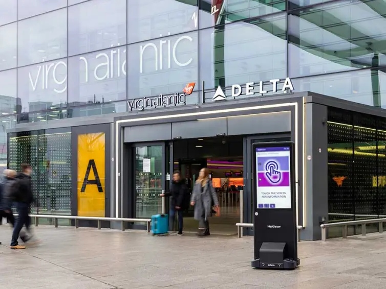 inform digital totem outside at heathrow airport, virgin delta check-in area.